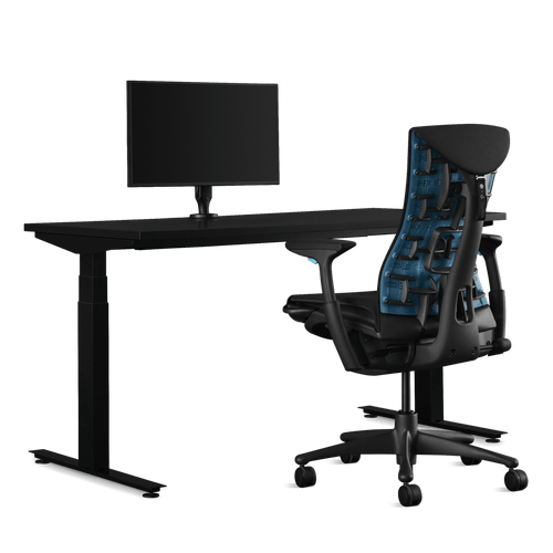 Herman Miller-gamingbundel met een Nevi zit-sta-bureau, Ollin-monitorarm en een Logitech G Embody-stoel in cyaan.